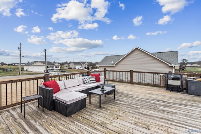 deck featuring area for grilling and outdoor lounge area