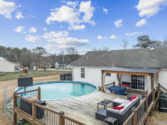 view of pool featuring a hot tub and a wooden deck