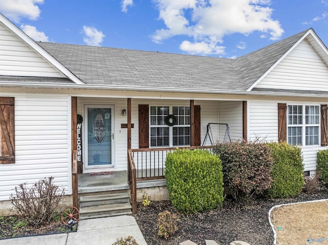 property entrance with covered porch