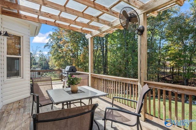 deck featuring a pergola and grilling area