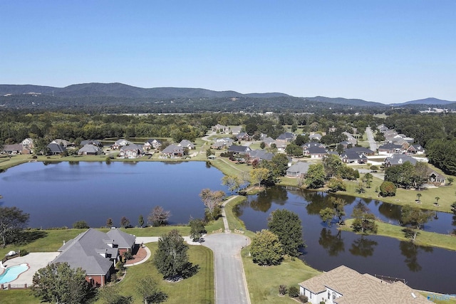 bird's eye view featuring a water and mountain view