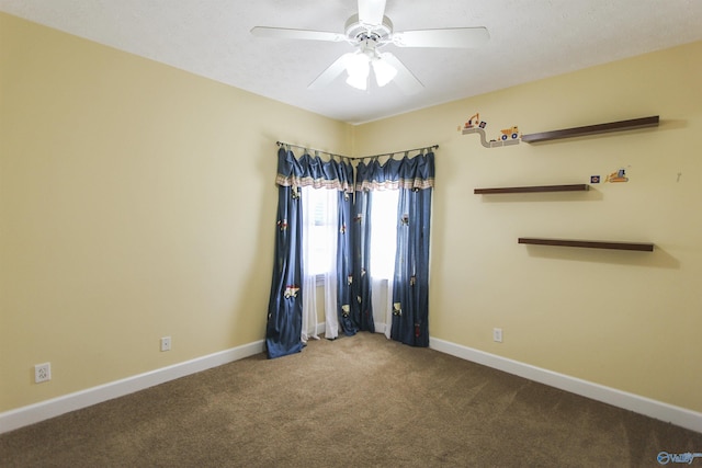 unfurnished room with carpet floors and ceiling fan