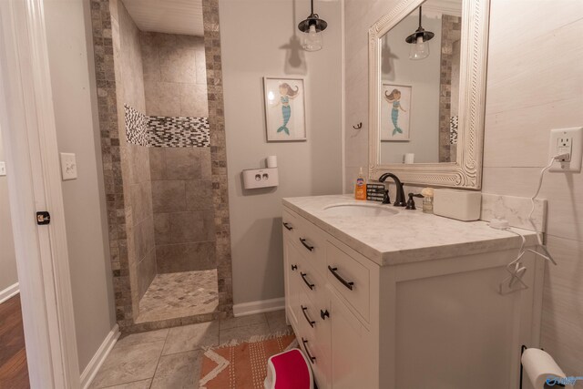 bathroom featuring tile patterned floors, vanity, crown molding, and toilet