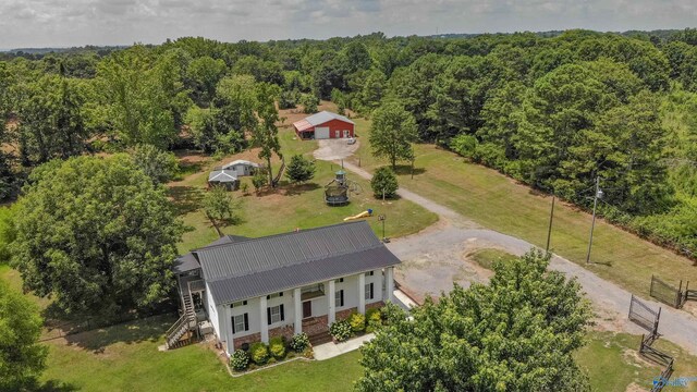 birds eye view of property featuring a rural view