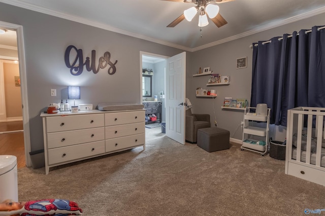 carpeted bedroom with ceiling fan and crown molding