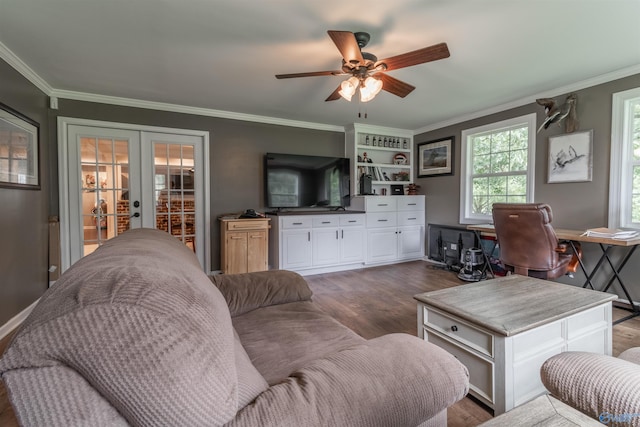 living room featuring crown molding, dark hardwood / wood-style floors, ceiling fan, and french doors