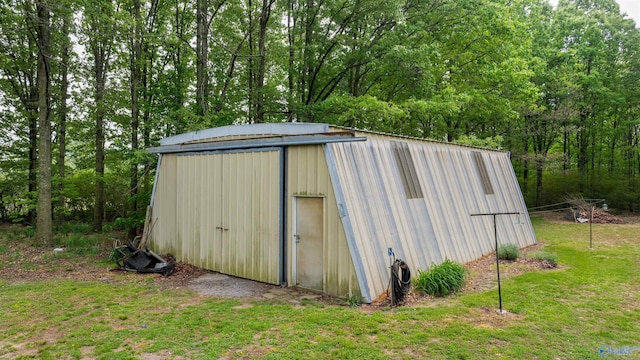 view of shed featuring a wooded view