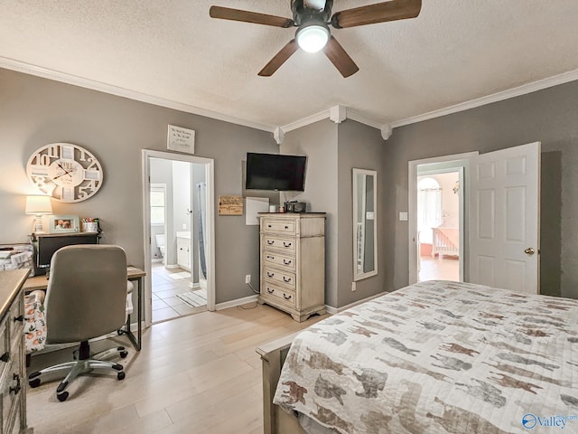 bedroom with ceiling fan, crown molding, ensuite bathroom, a textured ceiling, and light wood-type flooring