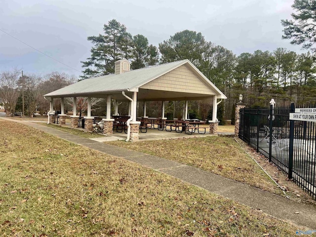 view of community with a gazebo and a lawn