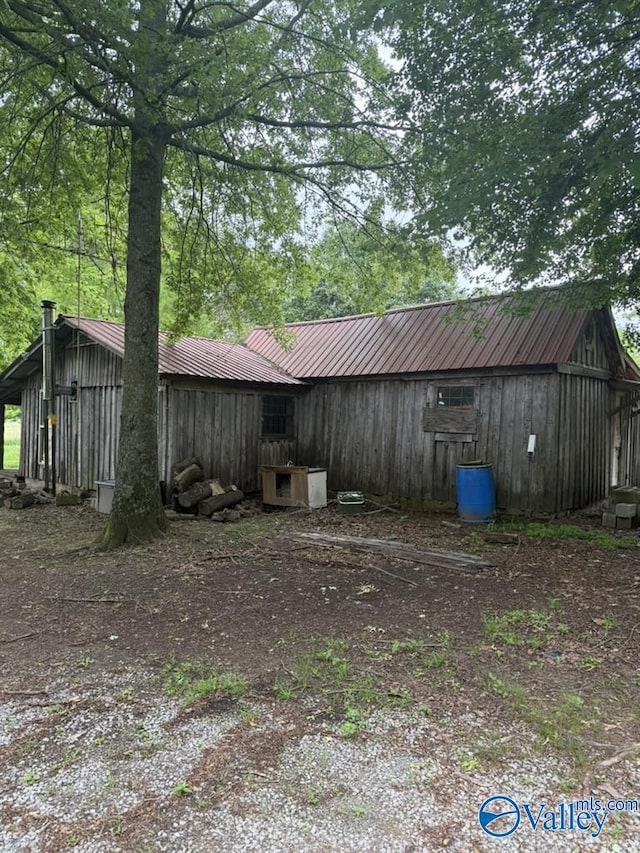 1522 County Road 138, Rainsville, AL 35978 - view of side of property with metal roof