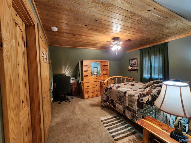 carpeted bedroom featuring ornamental molding, vaulted ceiling, ceiling fan, and wooden ceiling