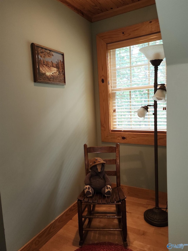 living area with hardwood / wood-style flooring