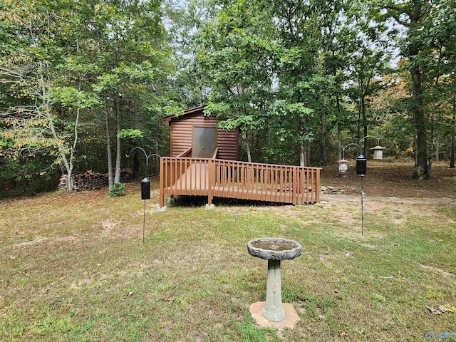 view of yard with a wooden deck