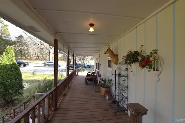 wooden terrace with covered porch