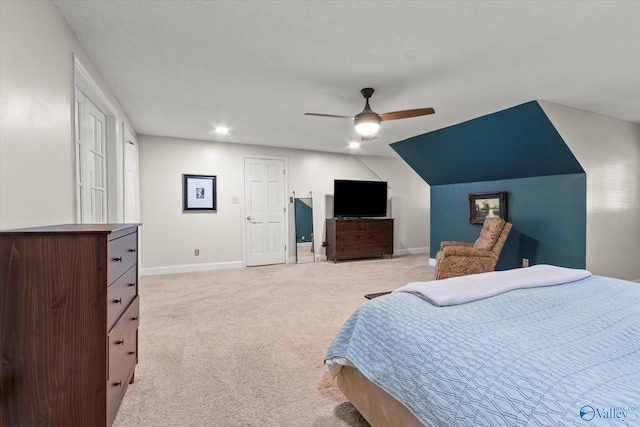 bedroom featuring ceiling fan and light carpet