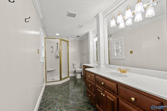 bathroom featuring toilet, walk in shower, vanity, a textured ceiling, and ornate columns