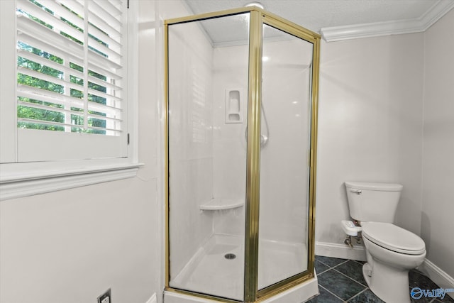 bathroom featuring tile patterned flooring, toilet, ornamental molding, and walk in shower