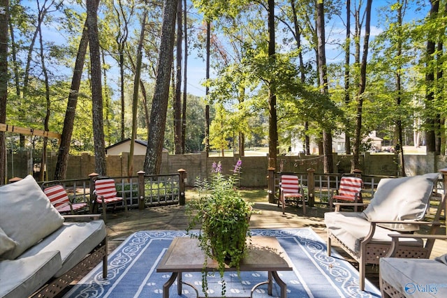 view of patio / terrace with a wooden deck and outdoor lounge area