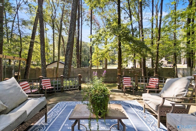 view of patio / terrace with a fenced backyard, an outdoor hangout area, and a wooden deck