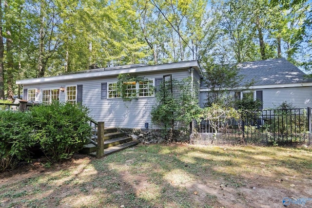 view of front of property with fence