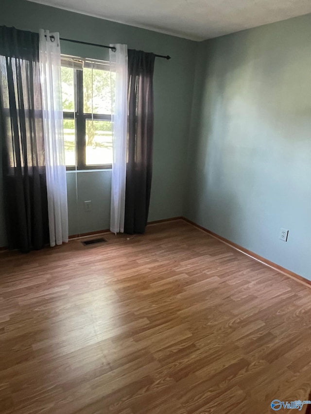 136 Atnip Dr, Scottsboro, AL 35769 - unfurnished room with wood finished floors and baseboards