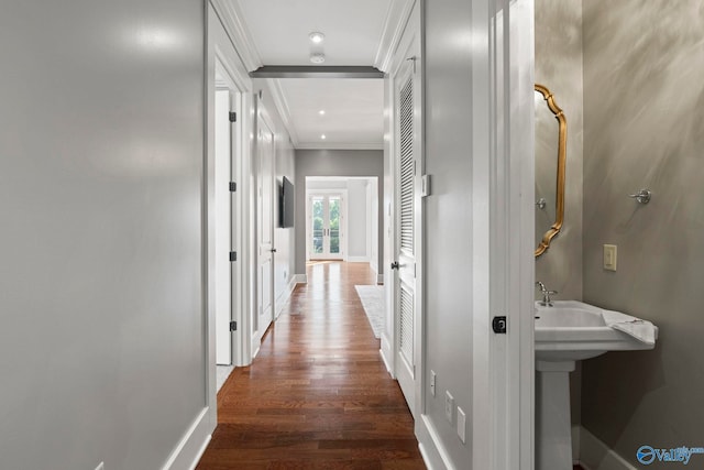 301 NE Holmes Ave Unit 404, Huntsville, AL 35801 - hall featuring ornamental molding and wood finished floors