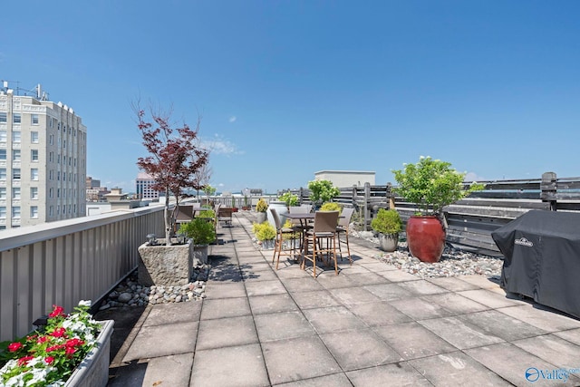 301 NE Holmes Ave Unit 404, Huntsville, AL 35801 - view of patio featuring area for grilling and outdoor dining space