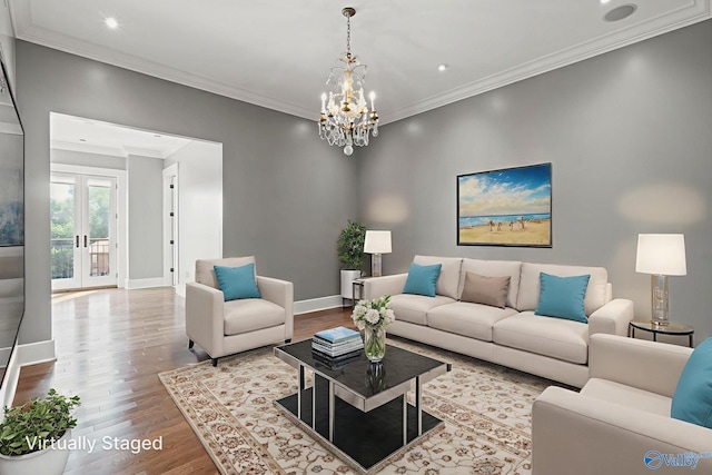 301 NE Holmes Ave Unit 404, Huntsville, AL 35801 - living room with wood finished floors, a chandelier, ornamental molding, recessed lighting, and french doors