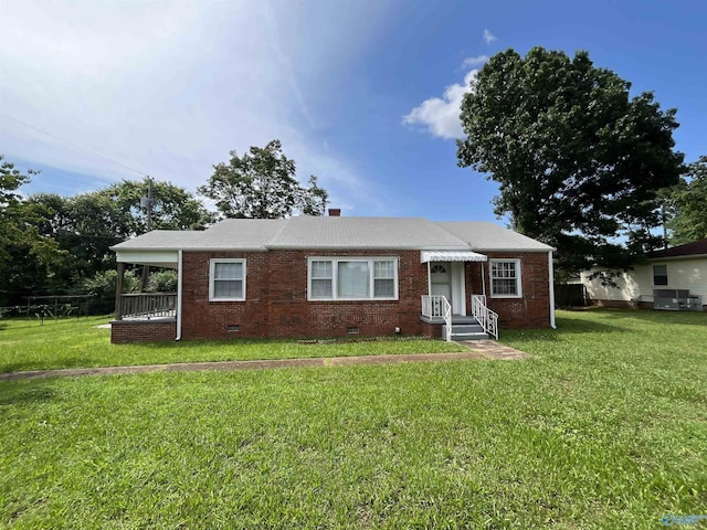 2305 Andrew Jackson Way NE, Huntsville, AL 35811 - view of front of home with crawl space, a front lawn, and brick siding