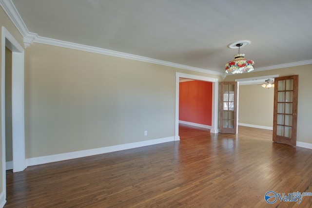 unfurnished room with dark wood-style floors, french doors, baseboards, and ornamental molding