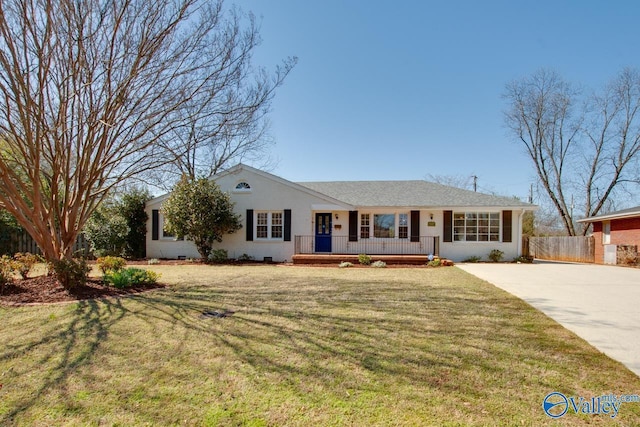 ranch-style house with stucco siding, covered porch, a front lawn, and fence