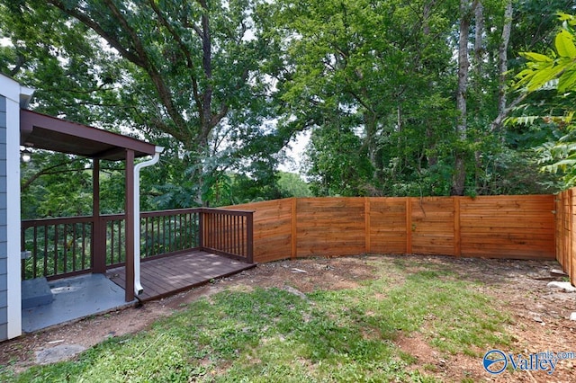 view of yard with a deck