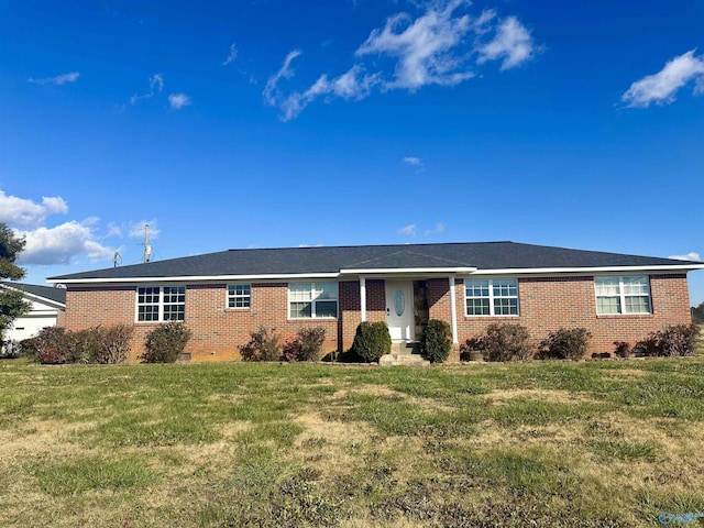 ranch-style house with a front yard