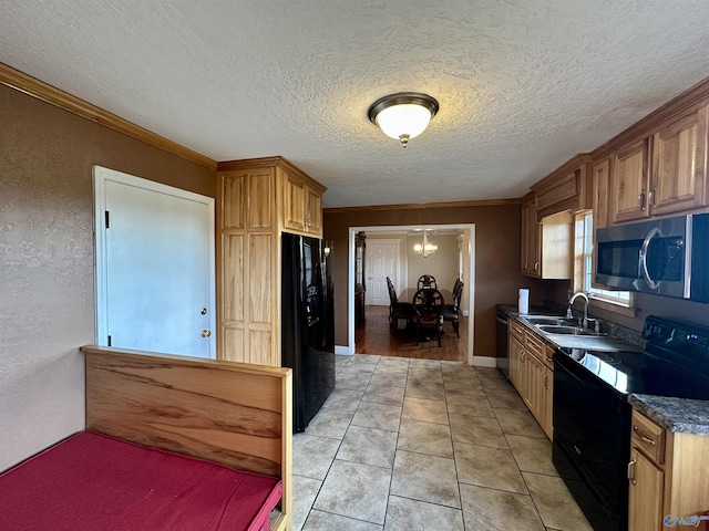 kitchen with a textured ceiling, sink, crown molding, and black appliances