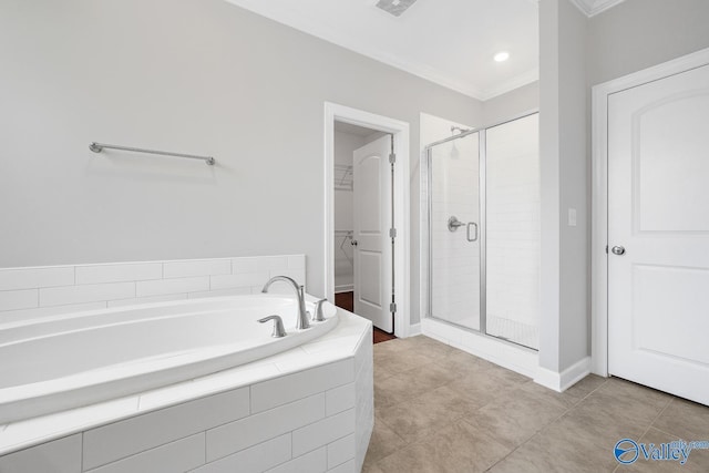 bathroom featuring tile patterned floors, ornamental molding, and shower with separate bathtub