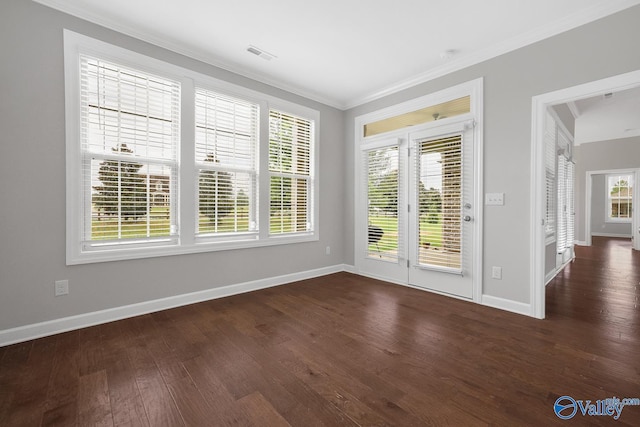 unfurnished room featuring crown molding and dark hardwood / wood-style flooring