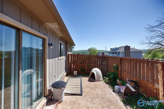 view of patio / terrace featuring fence
