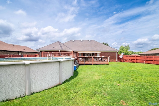 114 Sandi Paige Ln, Huntsville, AL 35811 - back of house featuring a deck and a fenced backyard