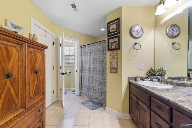 114 Sandi Paige Ln, Huntsville, AL 35811 - full bath with vanity, tile patterned floors, and a shower with curtain