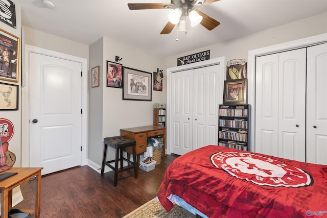 114 Sandi Paige Ln, Huntsville, AL 35811 - bedroom with multiple closets, dark wood finished floors, and ceiling fan