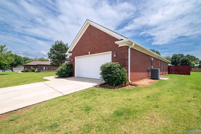 114 Sandi Paige Ln, Huntsville, AL 35811 - view of property exterior featuring brick siding, driveway, and a garage