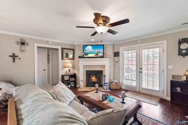 114 Sandi Paige Ln, Huntsville, AL 35811 - living room featuring ornamental molding, a ceiling fan, french doors, wood finished floors, and a fireplace with flush hearth