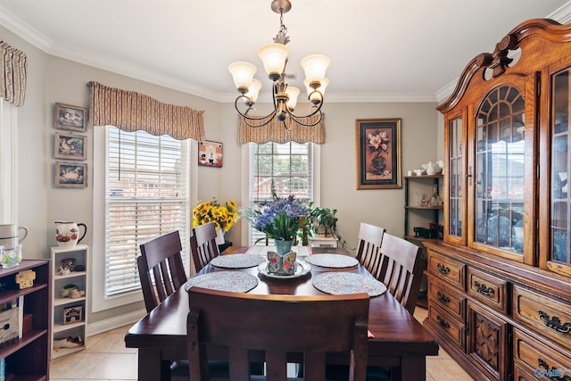 114 Sandi Paige Ln, Huntsville, AL 35811 - dining space with a chandelier, ornamental molding, and light tile patterned floors