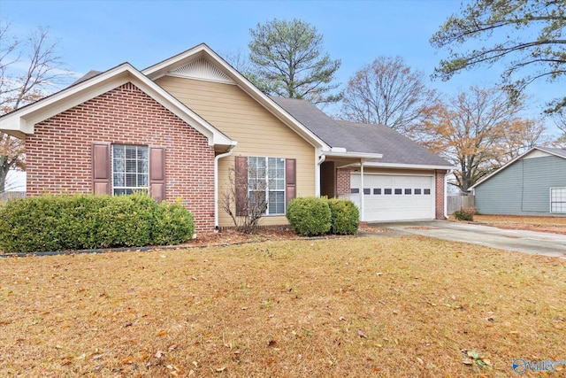 view of front of property with a front yard and a garage