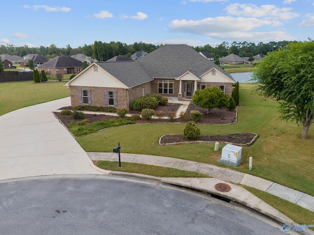 ranch-style house with a front lawn