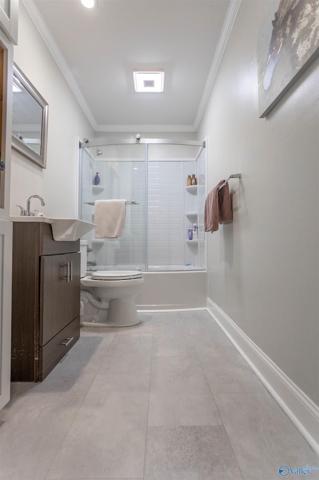 full bathroom featuring vanity, crown molding, toilet, and combined bath / shower with glass door