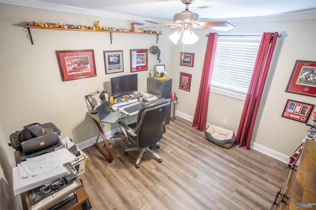 office area with ornamental molding and ceiling fan