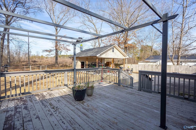 wooden deck with an outdoor structure