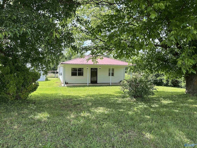 17441 E Limestone Rd, Athens, AL 35613 - view of front facade featuring a front lawn and metal roof