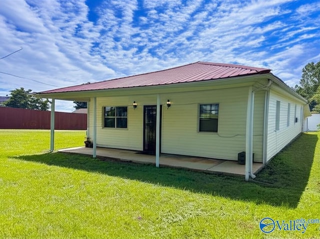 17441 E Limestone Rd, Athens, AL 35613 - back of property featuring a patio area and metal roof
